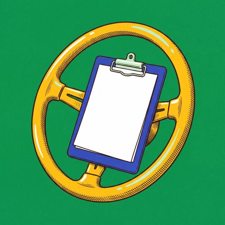 A yellow automotive steering wheel lies flat on a green surface with a cobalt-blue clipboard in its center.