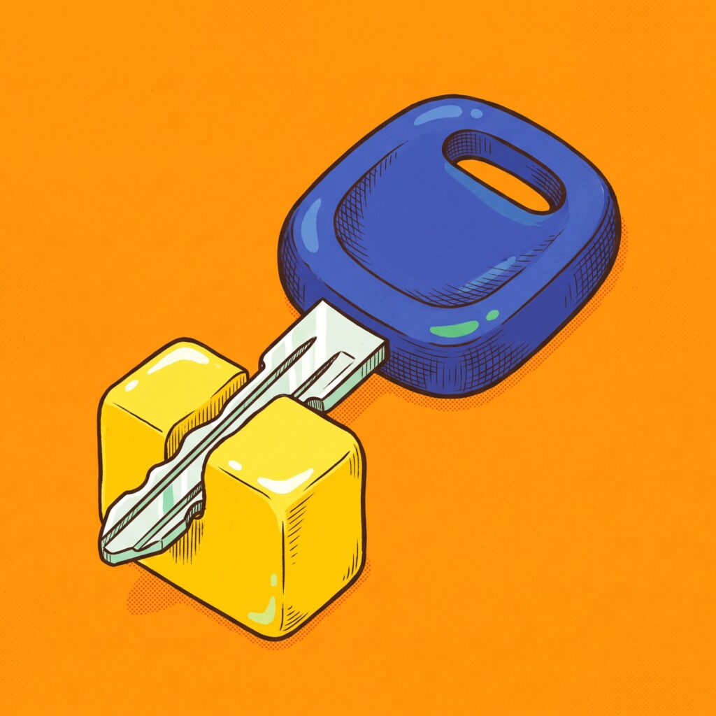 A cobalt car key slicing smoothly into a block of bright yellow butter on an orange background.